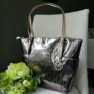 Nickel metallic Michael Kors jet setter handbag